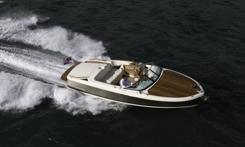 Aerial photo of Chris Craft motor yacht with teak