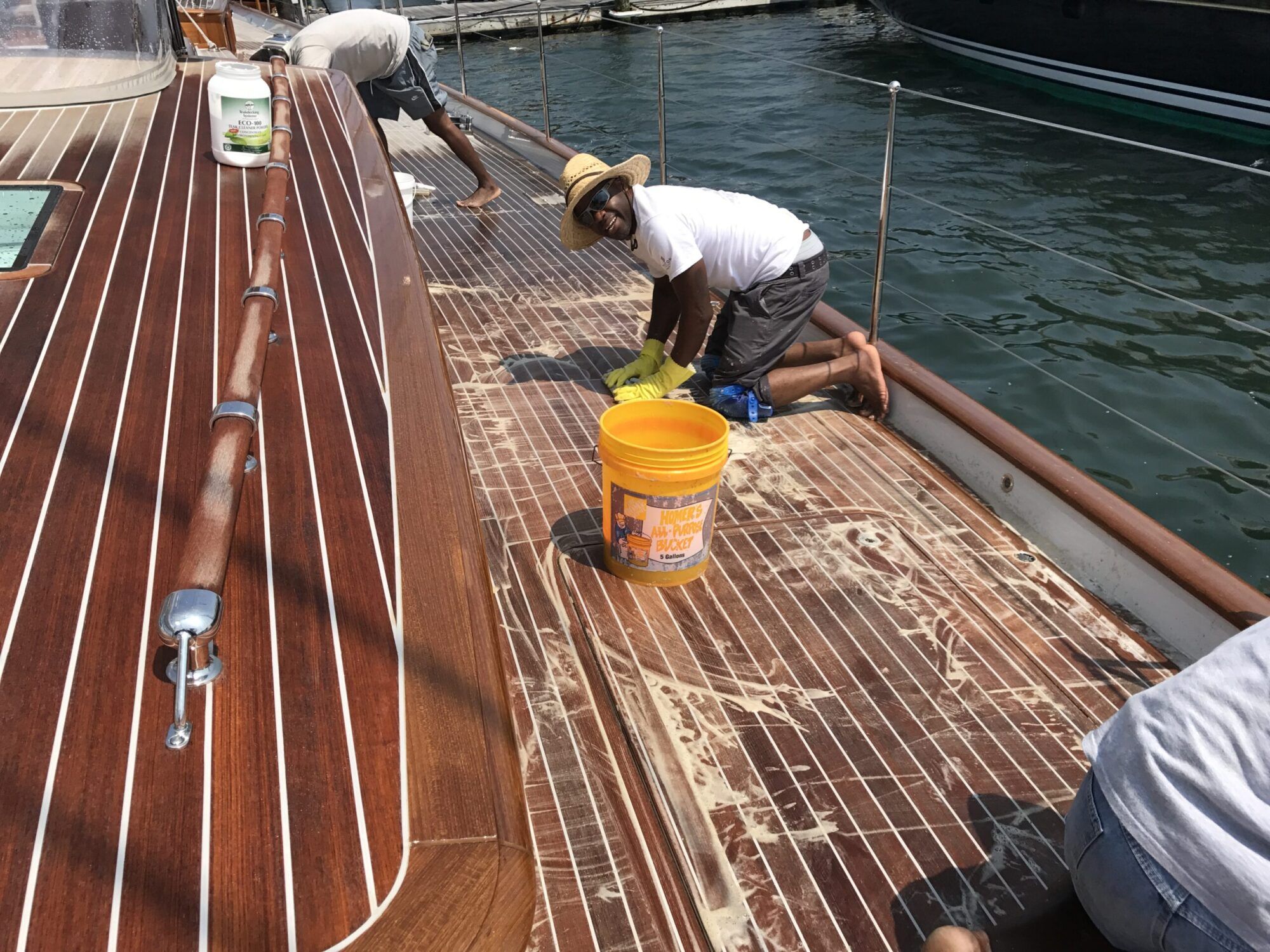 Cleaning teak decking with ECO-100 teak decking cleaner