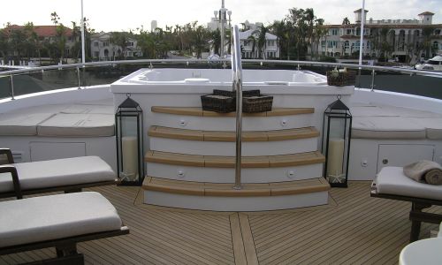 Photo of teak deck and steps leading to jacuzzi