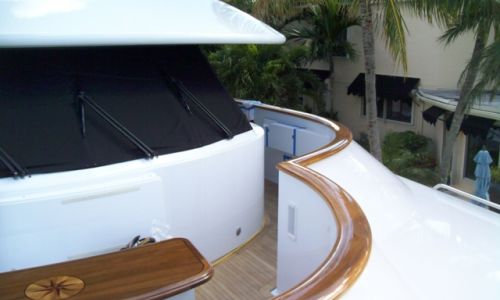 Photo of teak cap rail detail on yacht