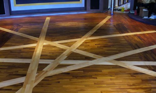 Photos of contemporary wooden deck flooring with inlaid pattern