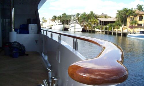 Photos of teak handrails on a yacht