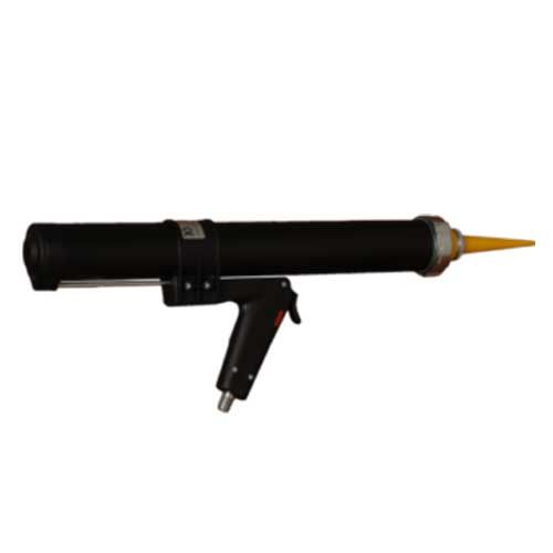 Photo of teak cartridge in a manual caulking gun