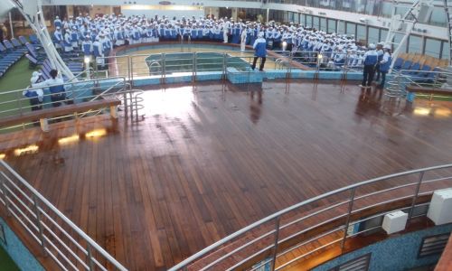 Teak deck on crusie ship shown during staff meeting photo