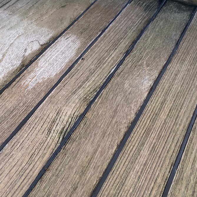 image of teak deck with deep ridges in the wood